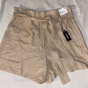 Express high wasted tan paperbag shorts